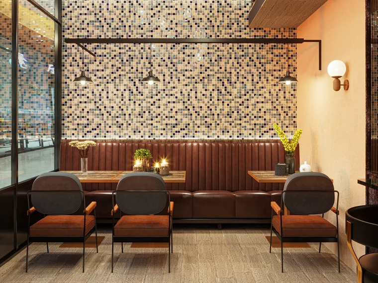 Coffee shop interior with mosaic wall and banquette seating