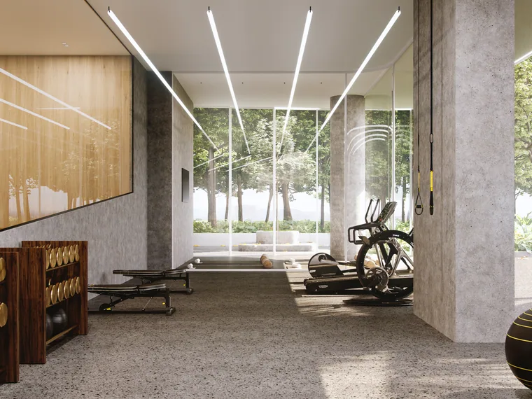 Ground-floor gym and lobby with full-height glazing
