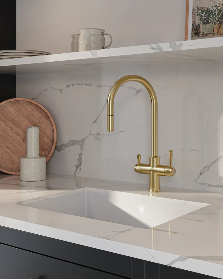 Three-way pull-out filter tap in brushed brass over marble